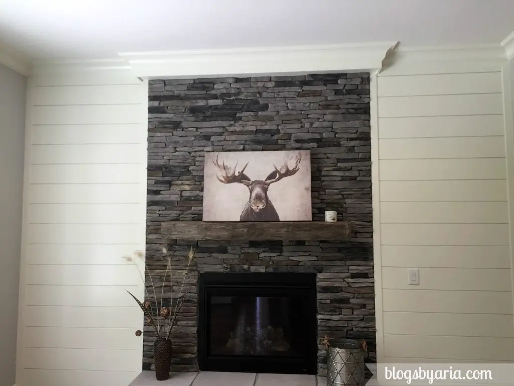 shiplap wall and stone fireplace in keeping room --Elks House