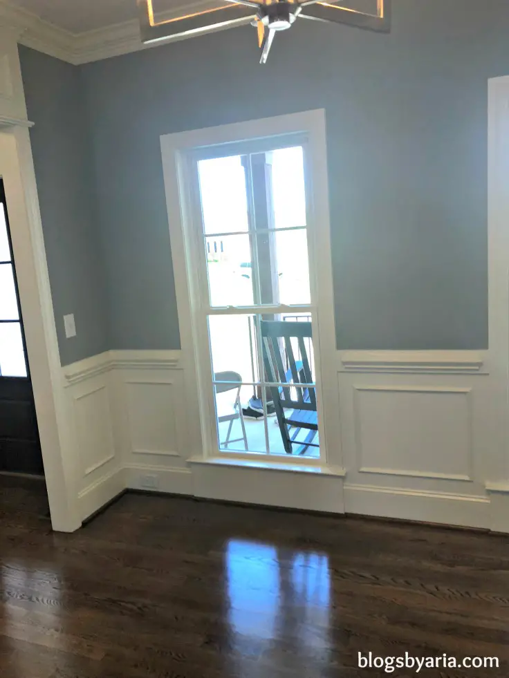 dining room wainscoting with long windows