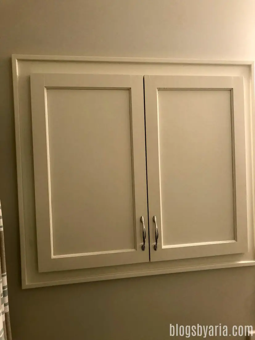 built-in medicine cabinet in guest bathroom
