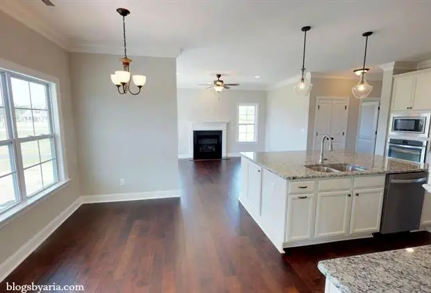 white kitchen with extra large kitchen island