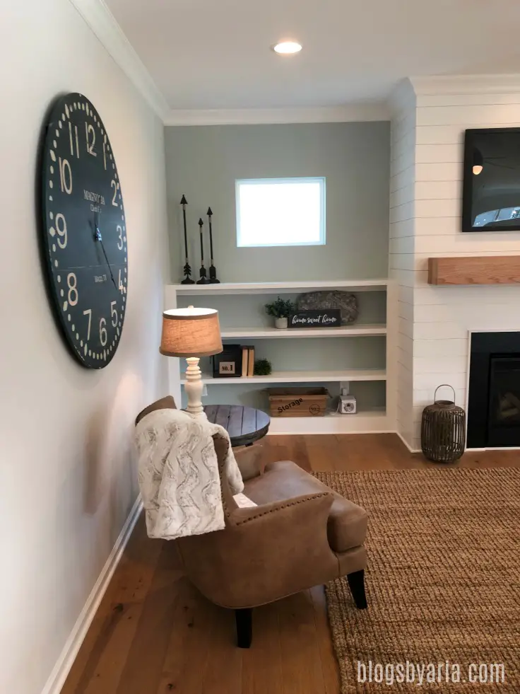 shiplap fireplace with built-in shelving