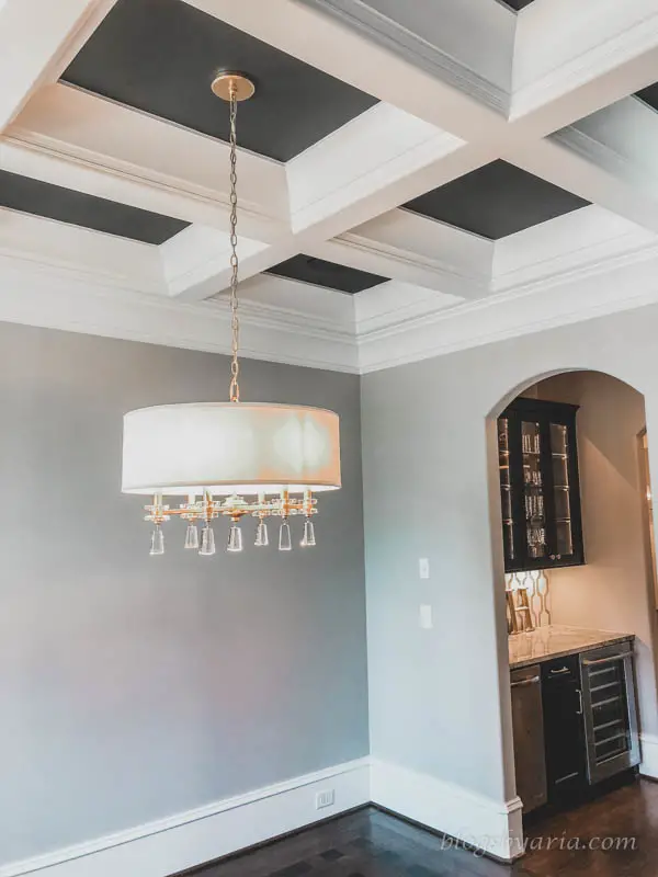 love the paint colors and the coffered ceiling with a peak into the butlers pantry