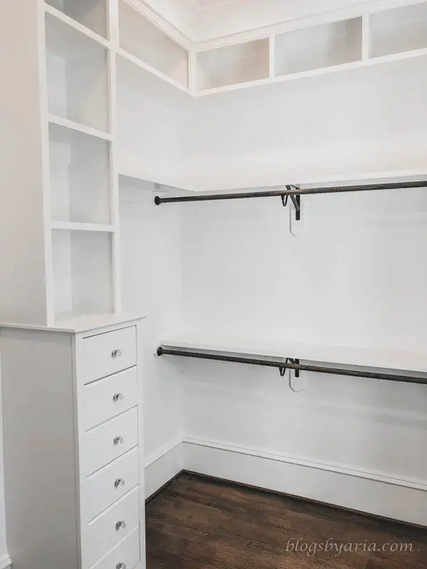 walk in closet with tons of storage