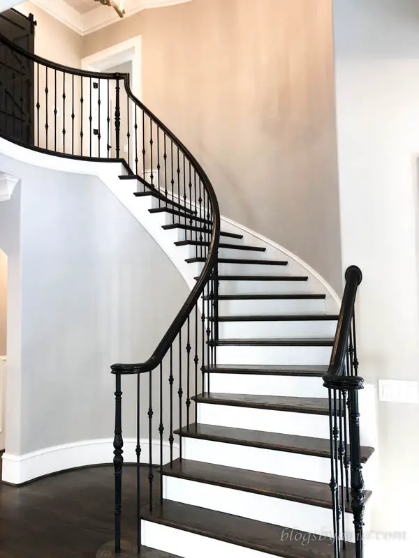 love the curved staircase such a statement