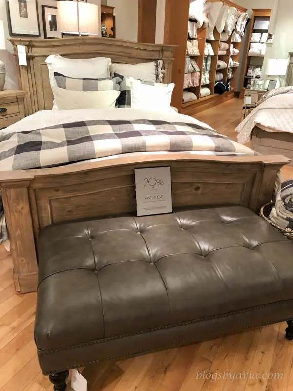 love this tufted leather ottoman as a bench for the foot of the bed