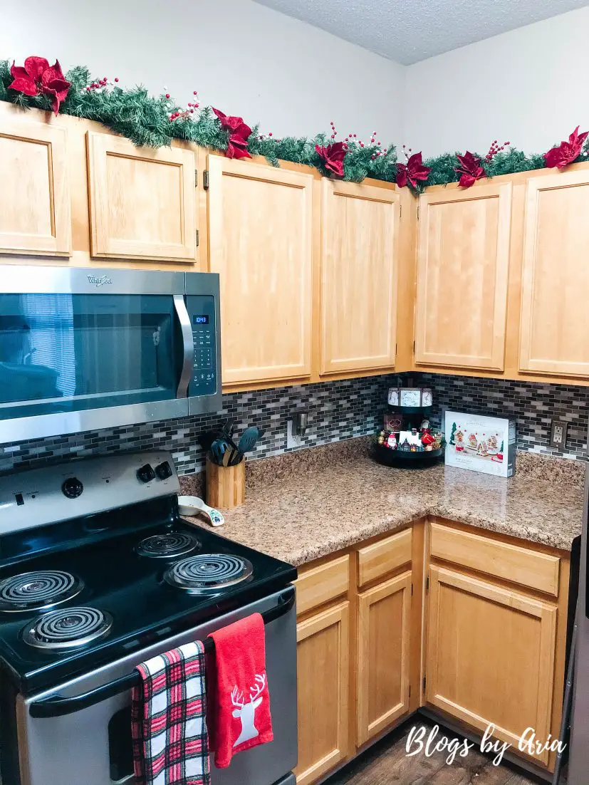 Christmas garland on cabinets