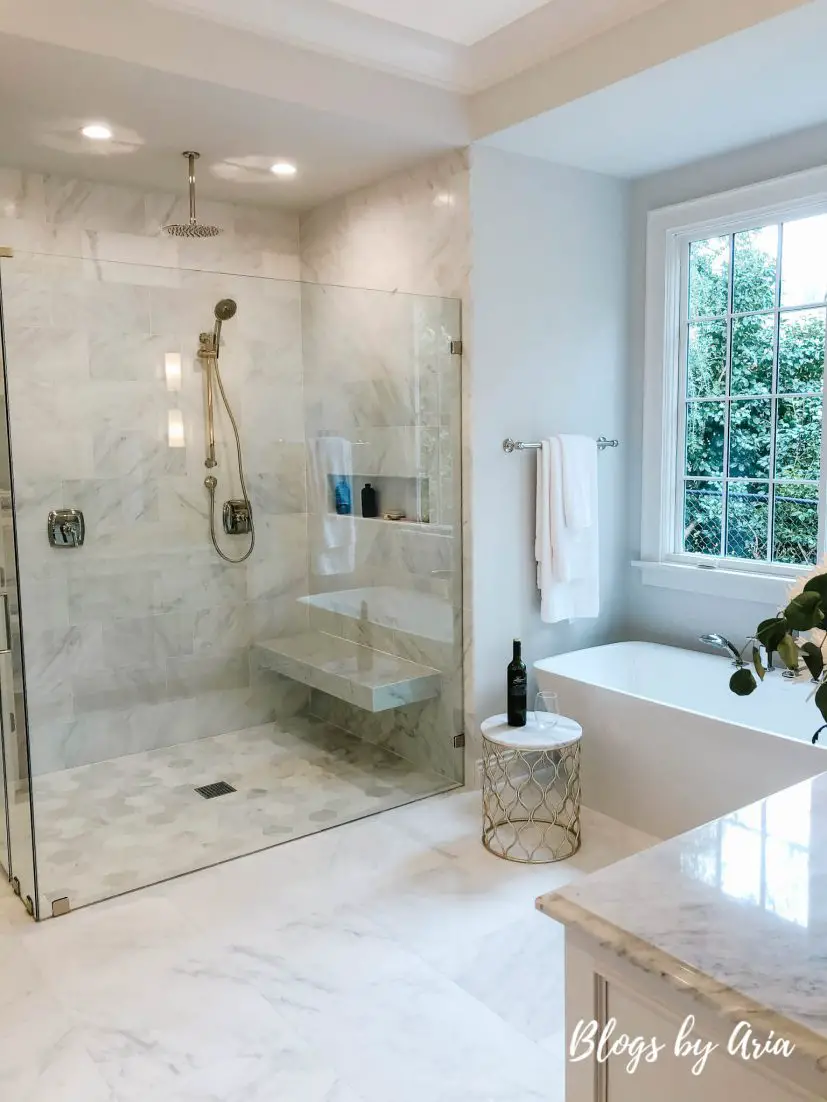 Example of a large-sized classic master white tile and marble tile white floor and marble floor bathroom design