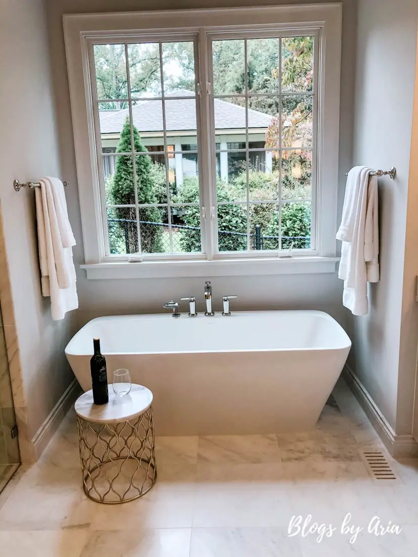 luxury master bathroom featuring freestanding soaker bathtub