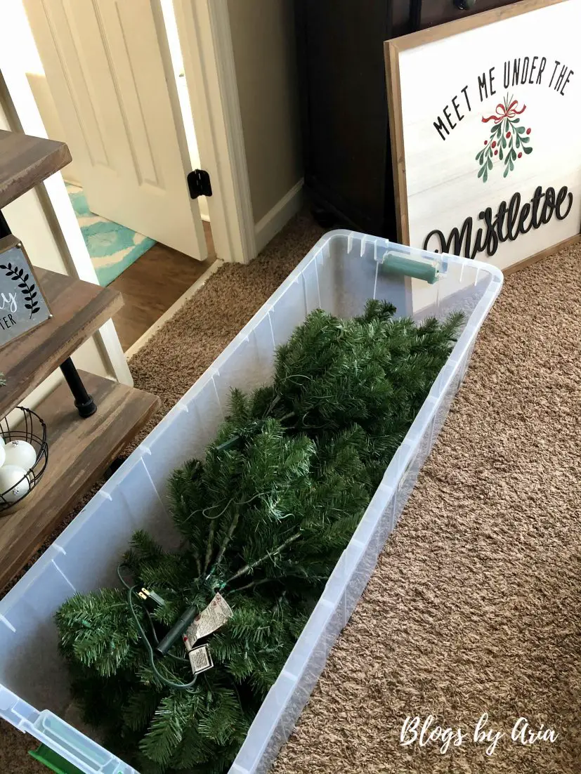 undecorate for the holidays using tree storage bins