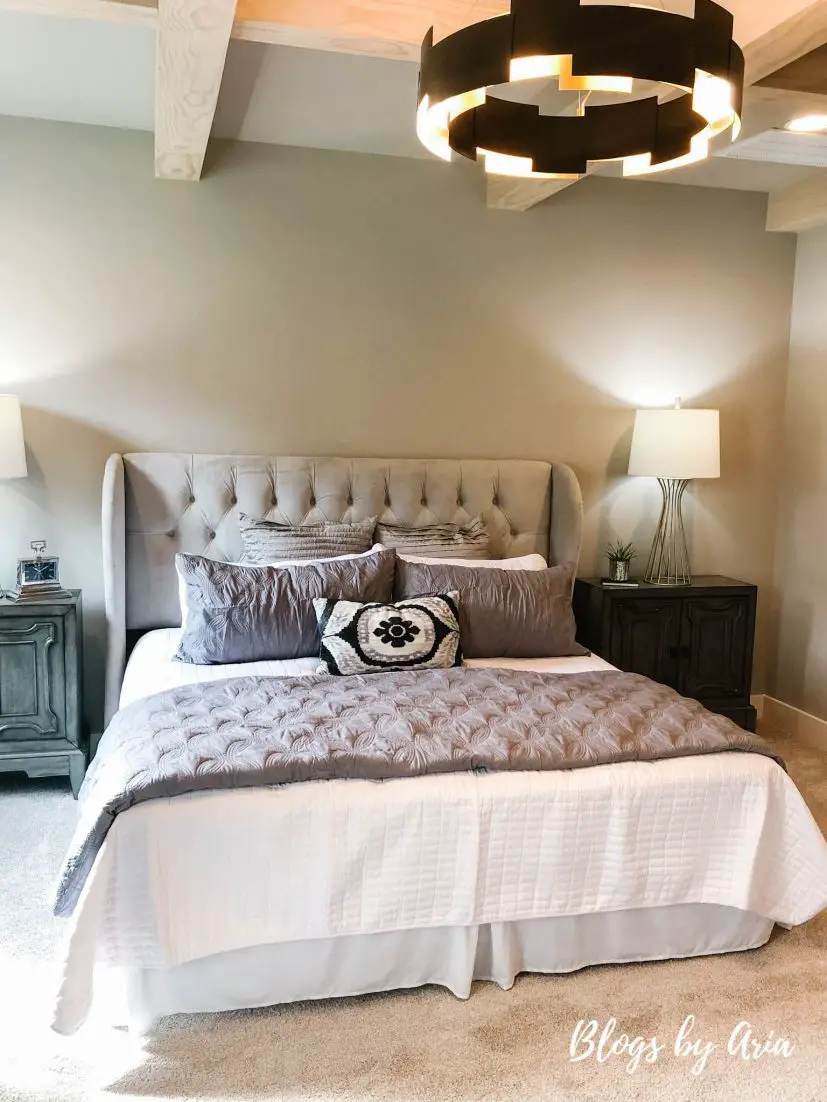 modern farmhouse bedroom with stained wood coffered ceilings