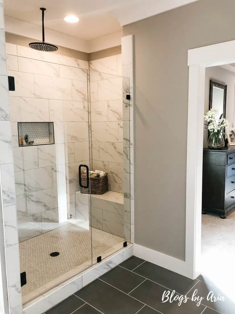 glam modern farmhouse bathroom with black fixtures