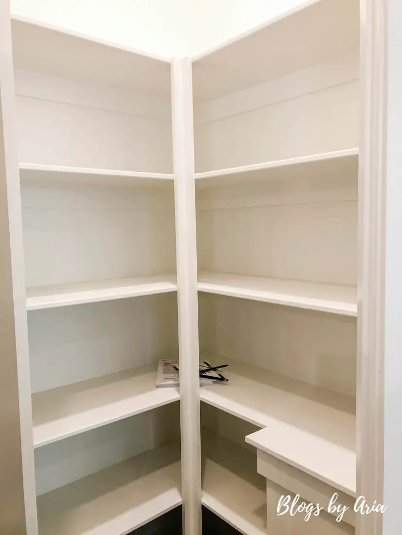 pantry with corner shelving