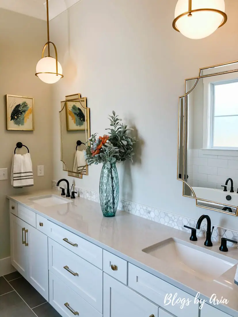 bathroom with gold lighting